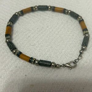 Handcrafted naturalist bracelet.